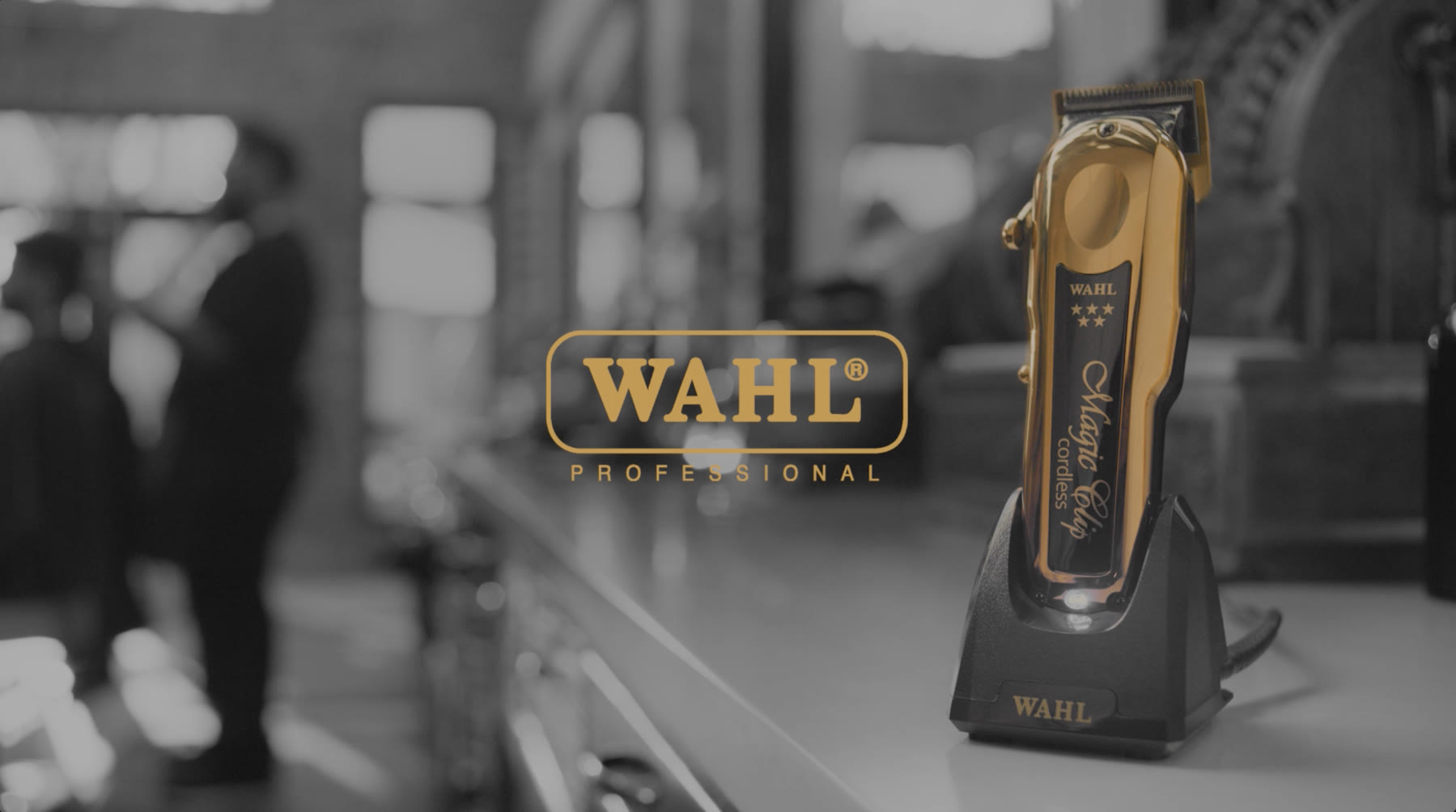 Gold Wahl Professional clipper beside the Wahl wordmark